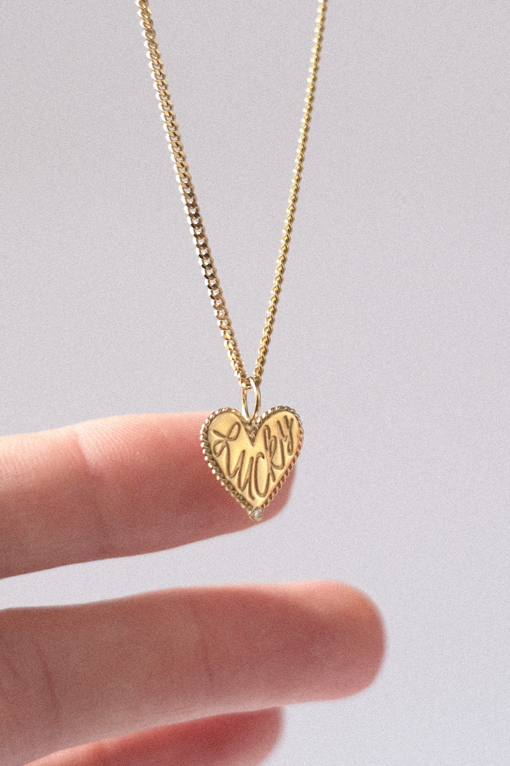 Der "Lucky Heart" Charm 18K Echtgold
