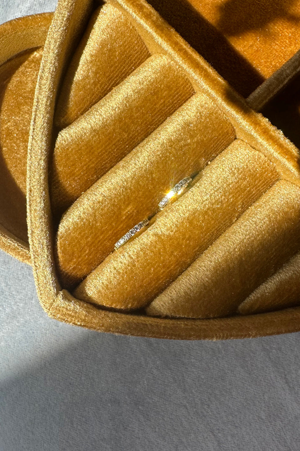 The "Mini Bling Diamond Hoop" 18K Solid Gold earrings with diamonds