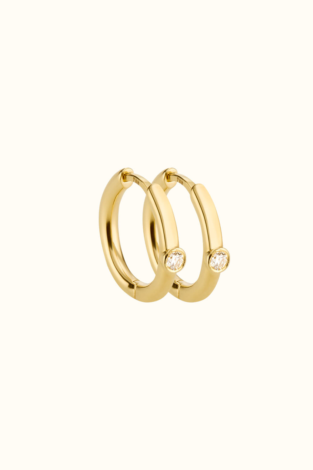 The "Mini Bling Diamond Hoop" 18k Fine Gold earrings with diamonds