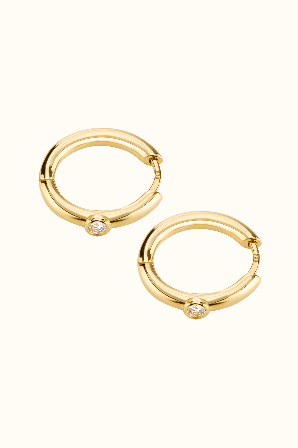 The "Mini Bling Diamond Hoop" 18k Fine Gold earrings with diamonds
