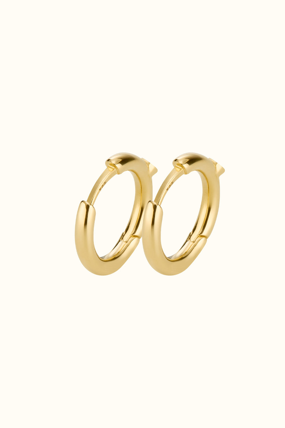 The "Mini Bling Diamond Hoop" 18k Fine Gold earrings with diamonds