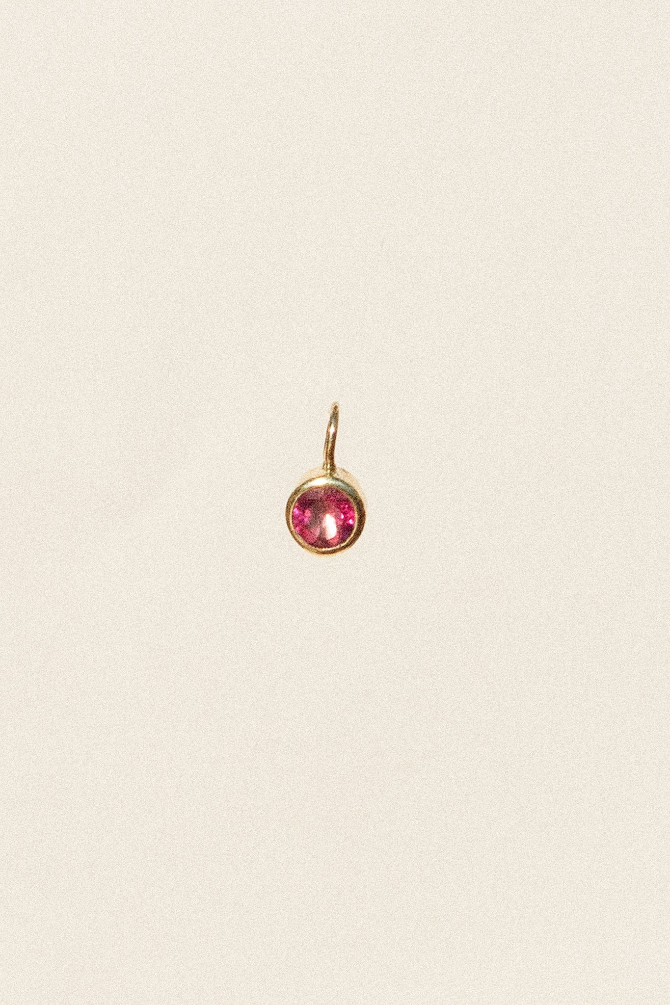 The Fine Gold Smiley Charm Pink Garnet